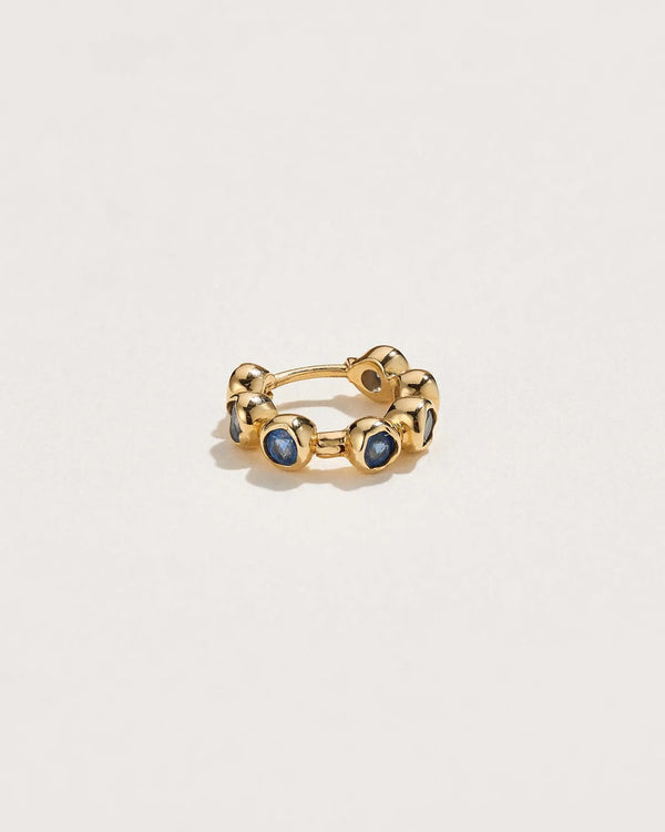 Molten Stone Huggie by Pamela Love – Piercing in #product_material# (#product_color#). 