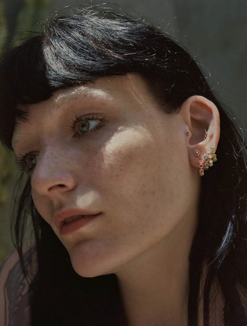 Molten Stone Huggie by Pamela Love – Piercing in #product_material# (#product_color#). 