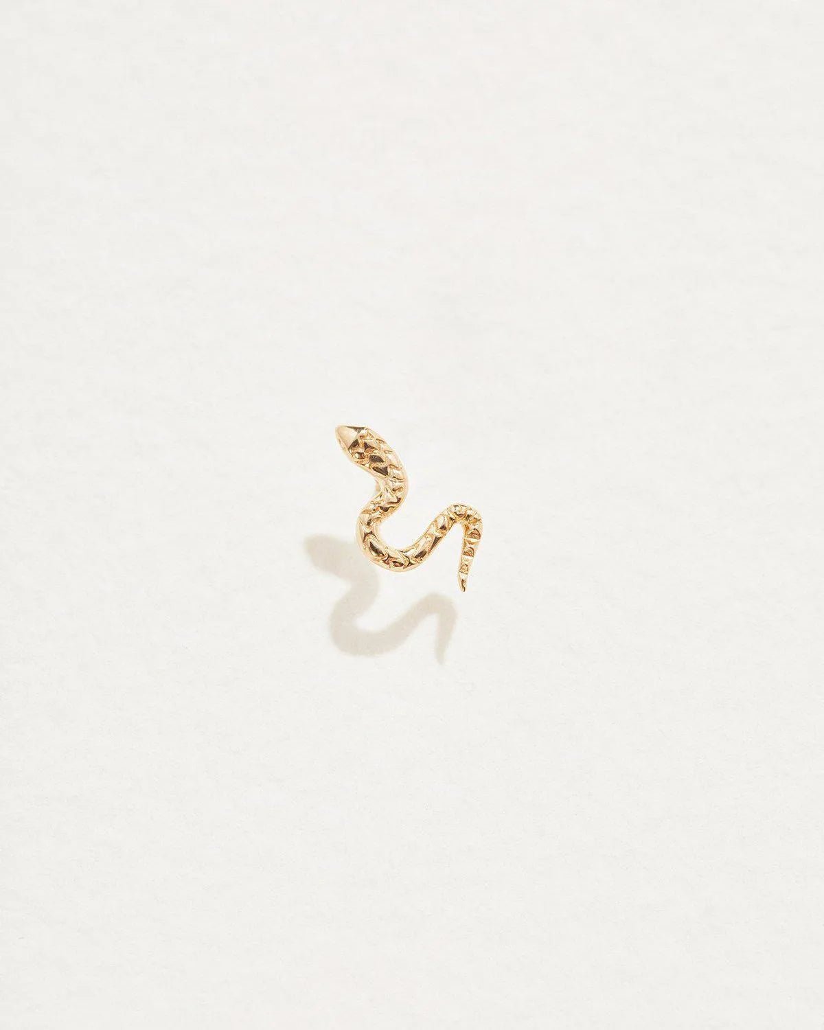 Serpent Stud by Pamela Love – Piercing in #product_material# (#product_color#).  snake-stud