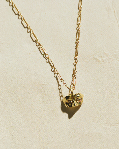 gold mask pendant