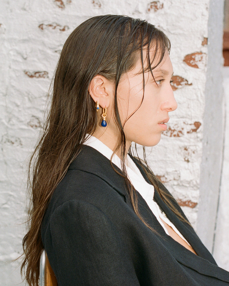 drop lapis lazuli earrings on the model