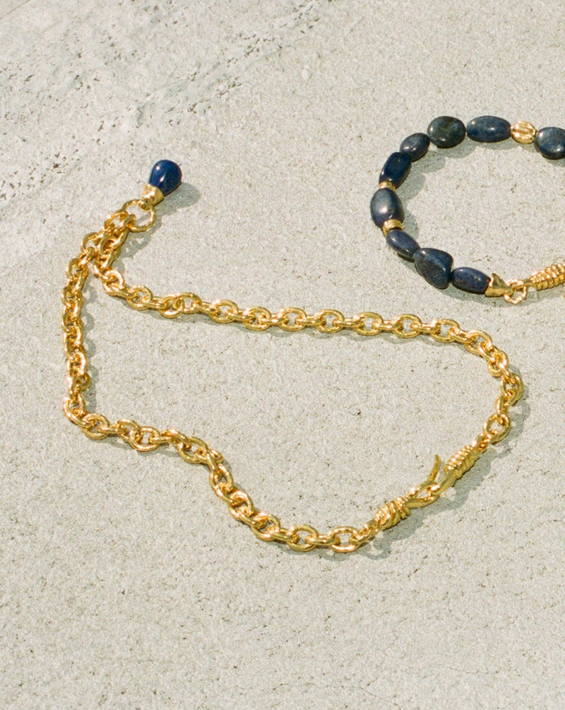 gold plate chain necklace with a lapis pendant