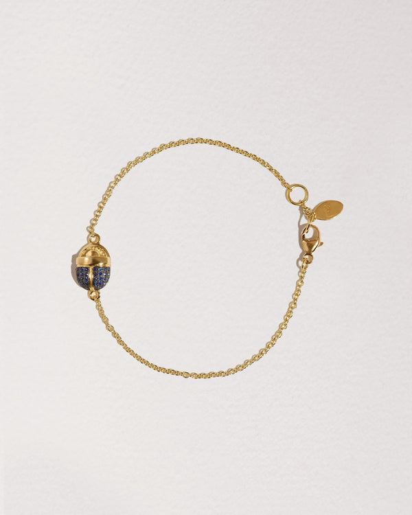 scarab gold chain bracelet with sapphire