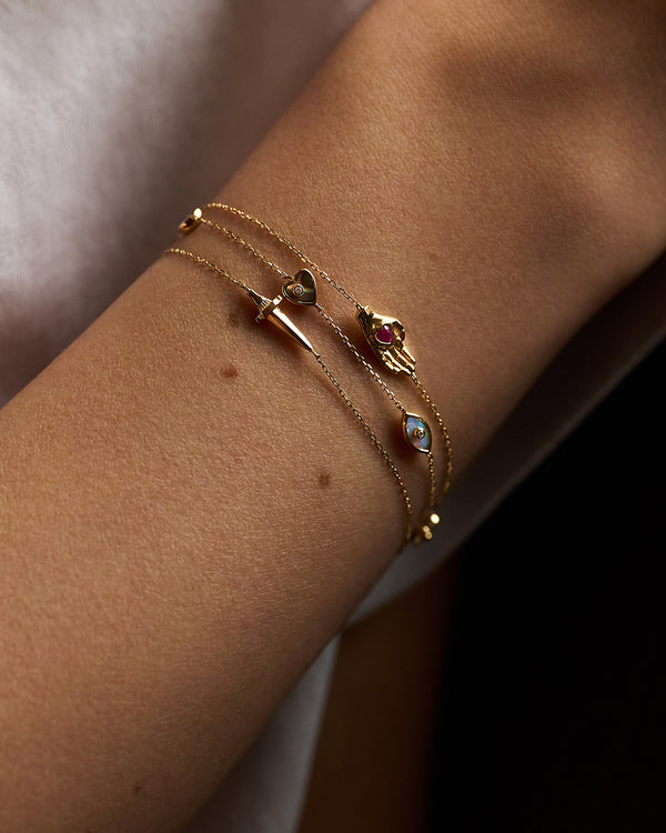 gold chain bracelets on the model