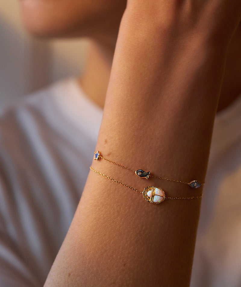 gibson opal scarab chain bracelet on the model