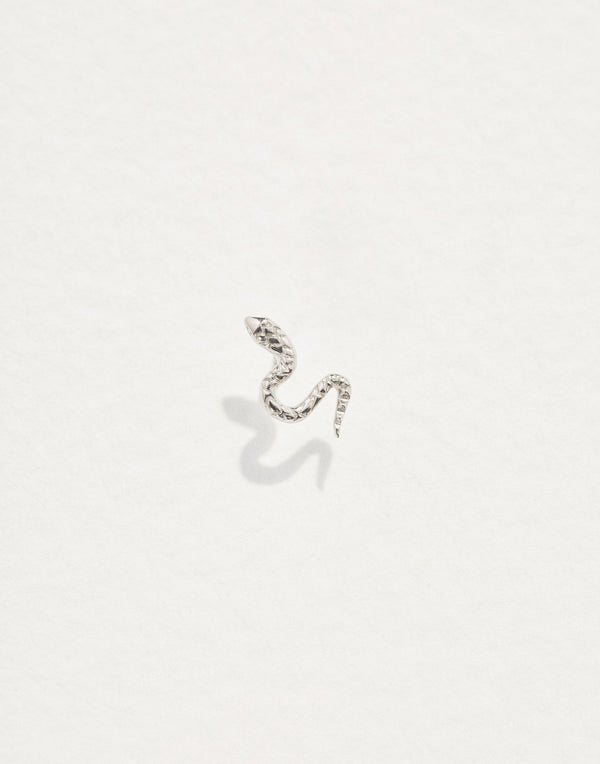 white gold snake stud piercing