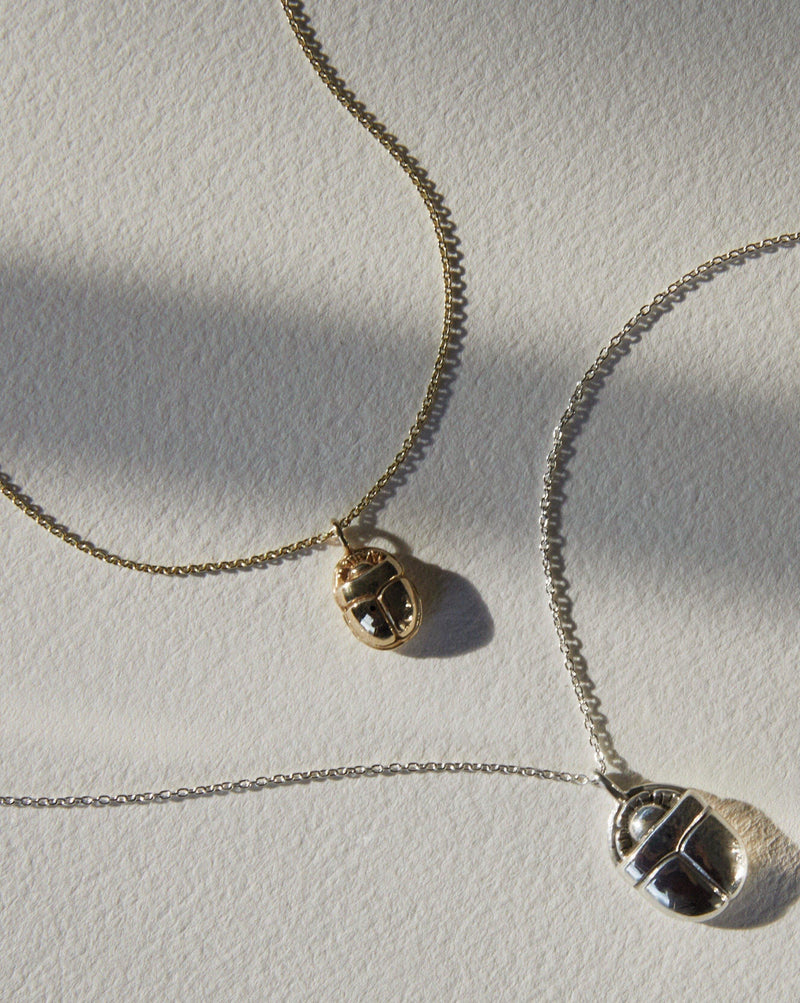scarab necklaces closeup