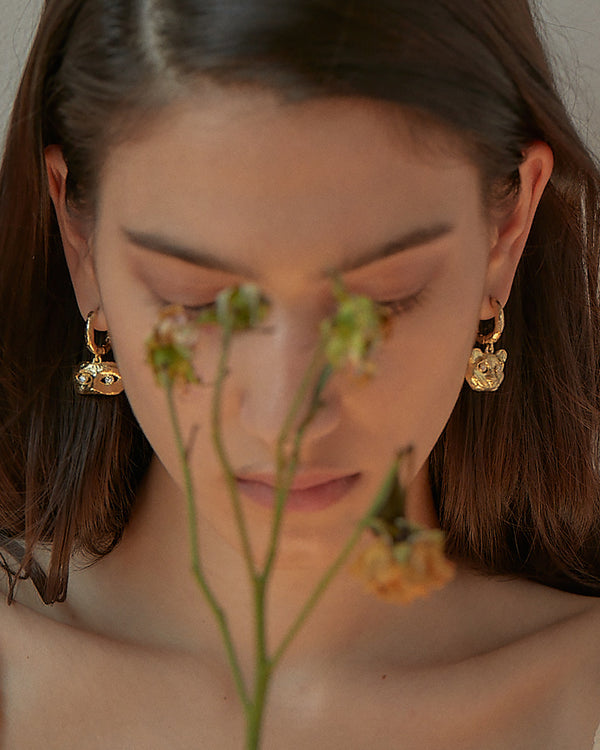 golden mask earrings