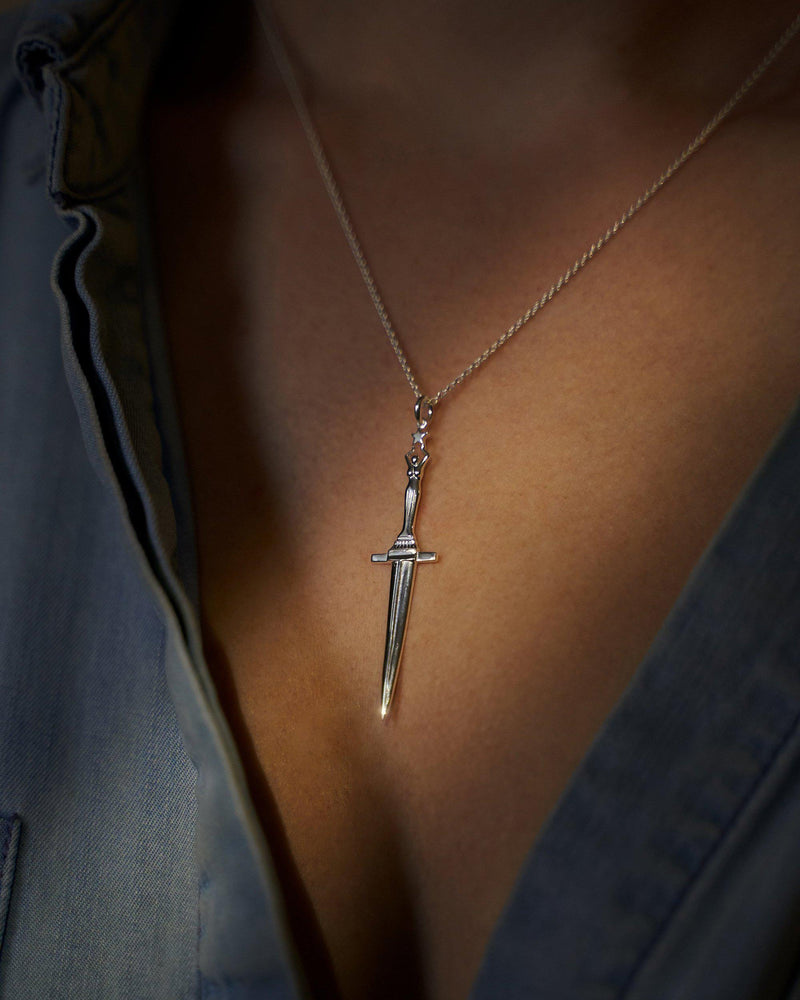 dagger necklace on model