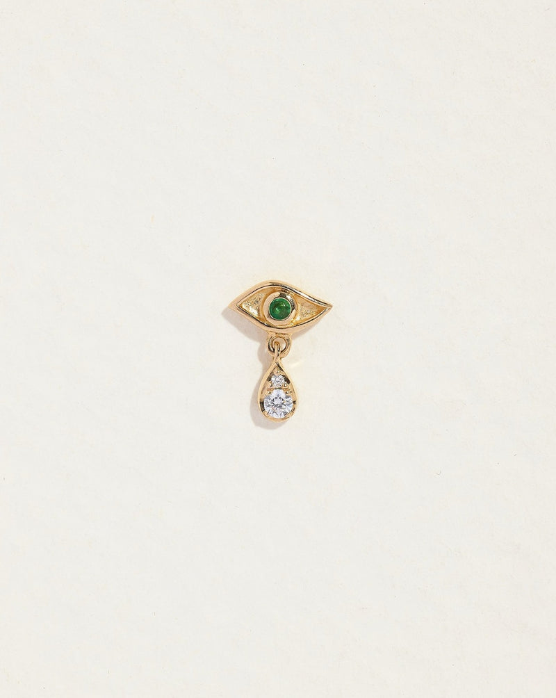 crying eye stud piercing with emerald eye and diamond teardrop