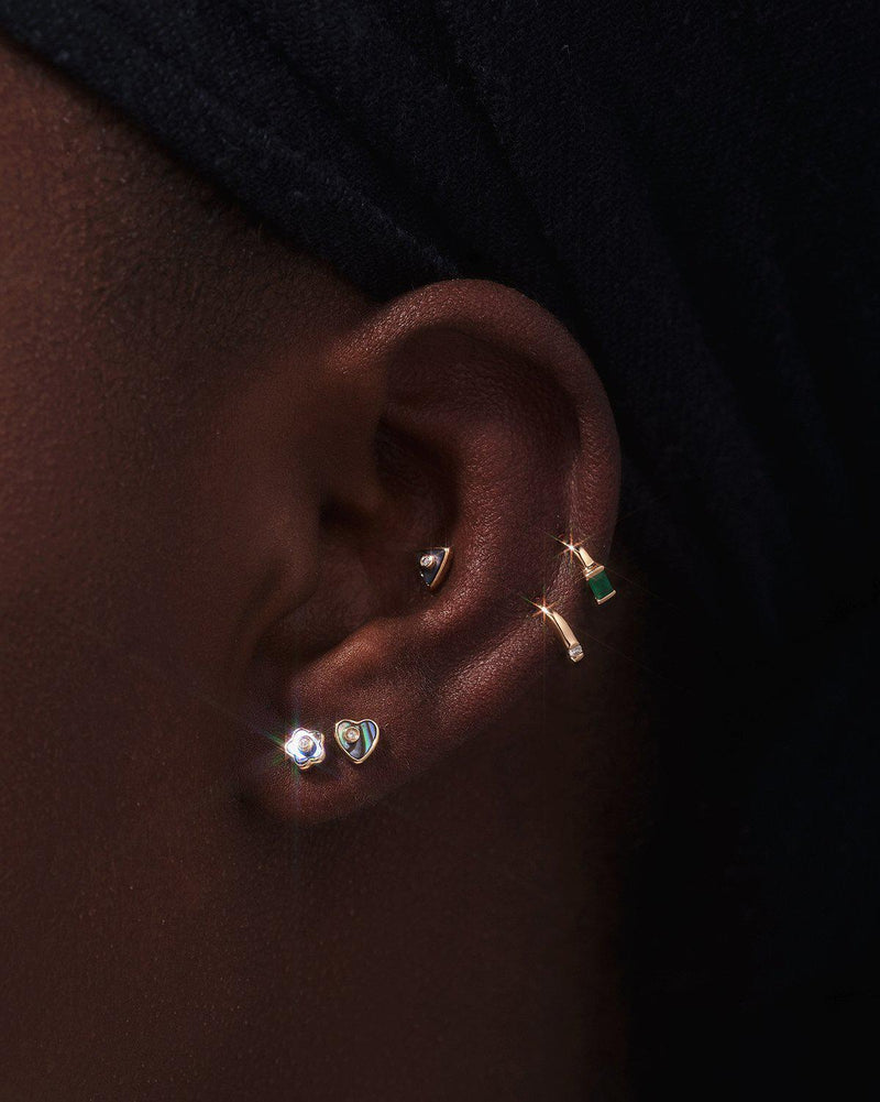 heart stud earring with diamond on the model