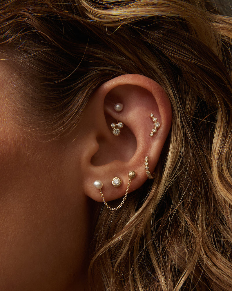 gold ear piercings