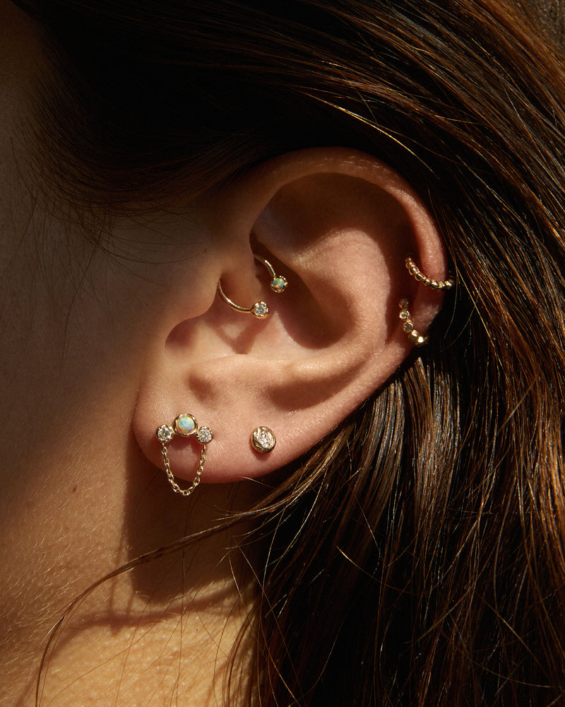 gold ear piercings
