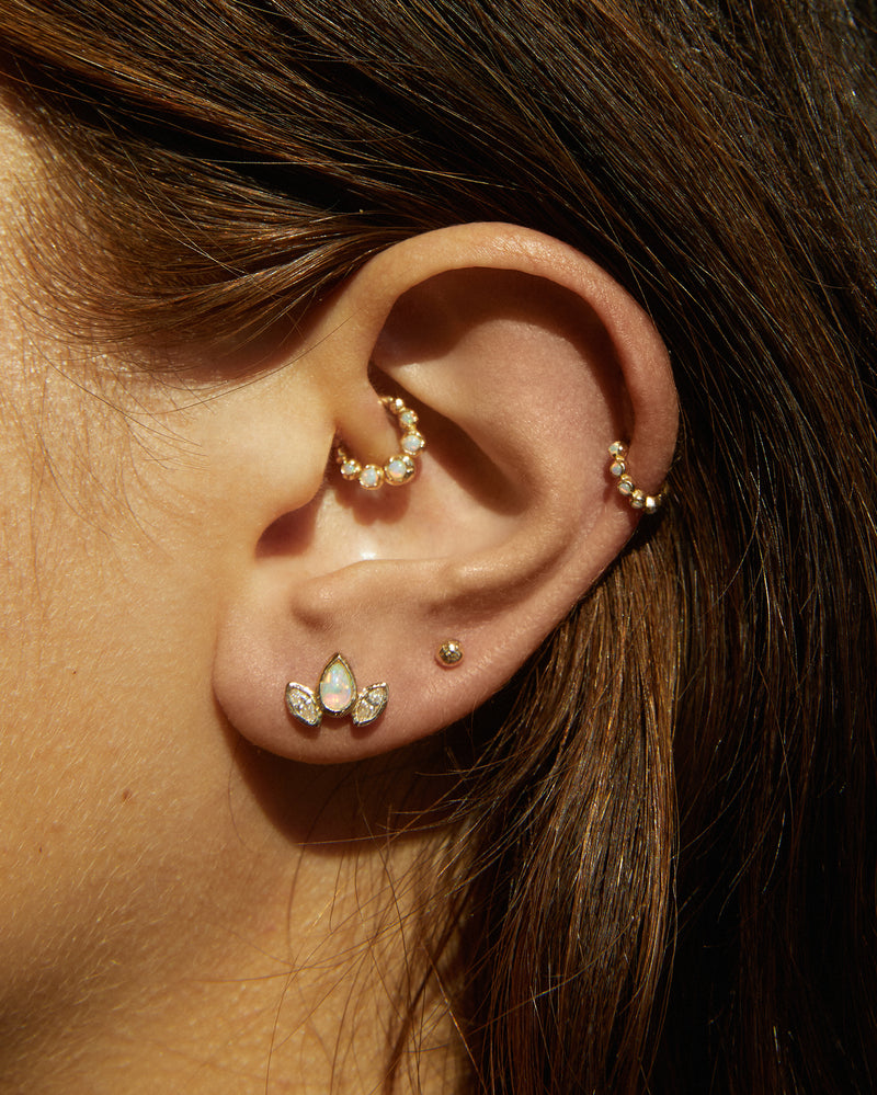 gold clicker piercing with diamonds
