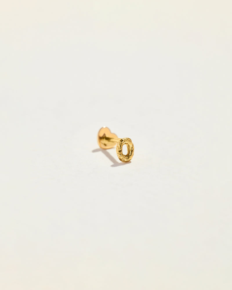 letter o initial stud piercing