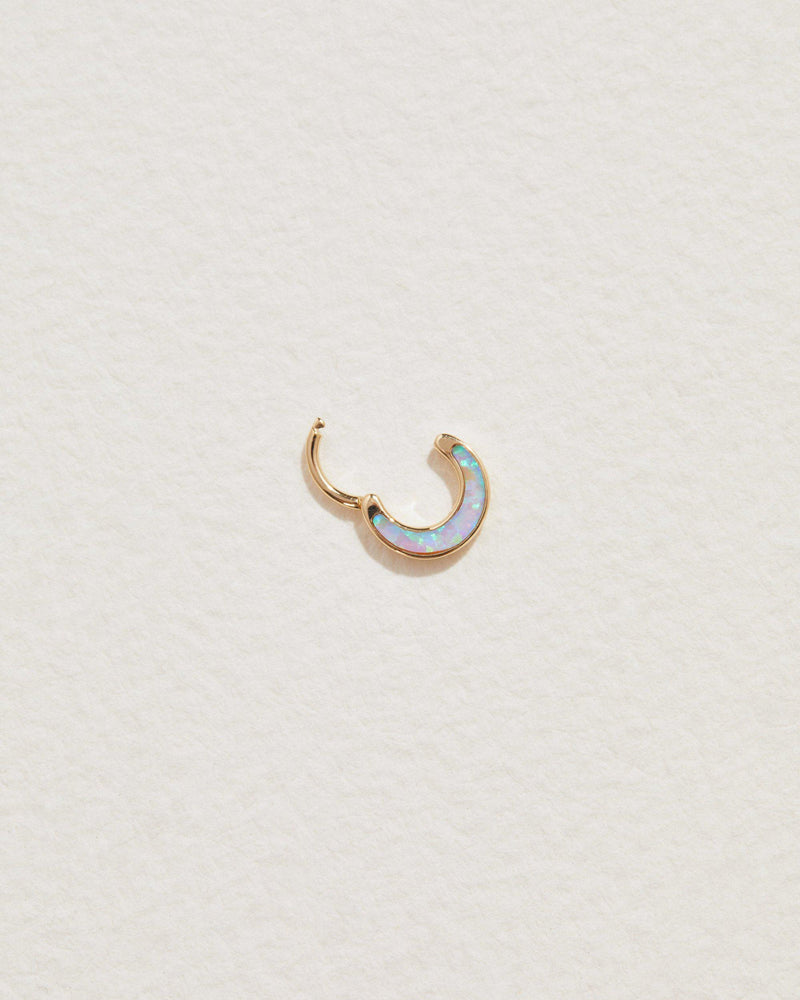 clicker piercing with opal inlay