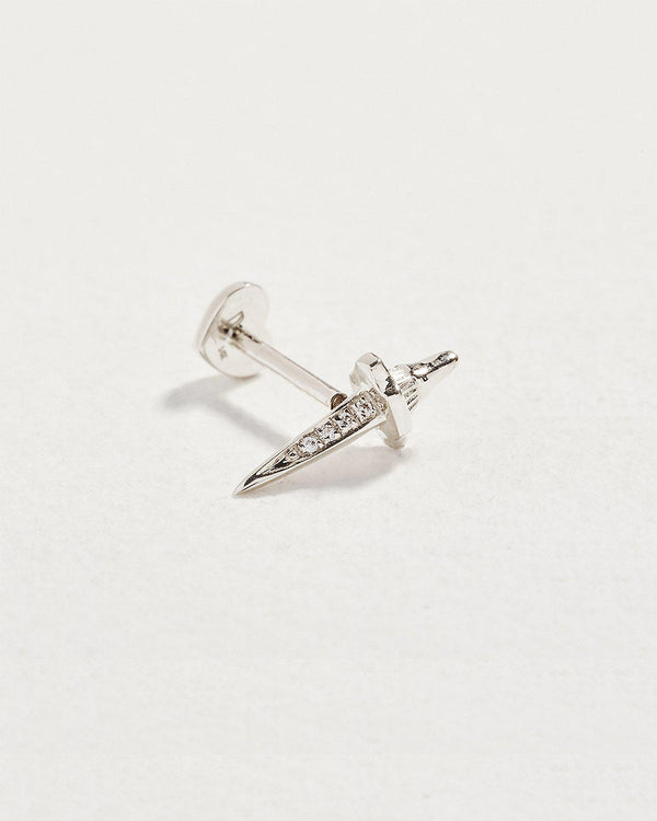 dagger stud piercing with white gold and diamonds