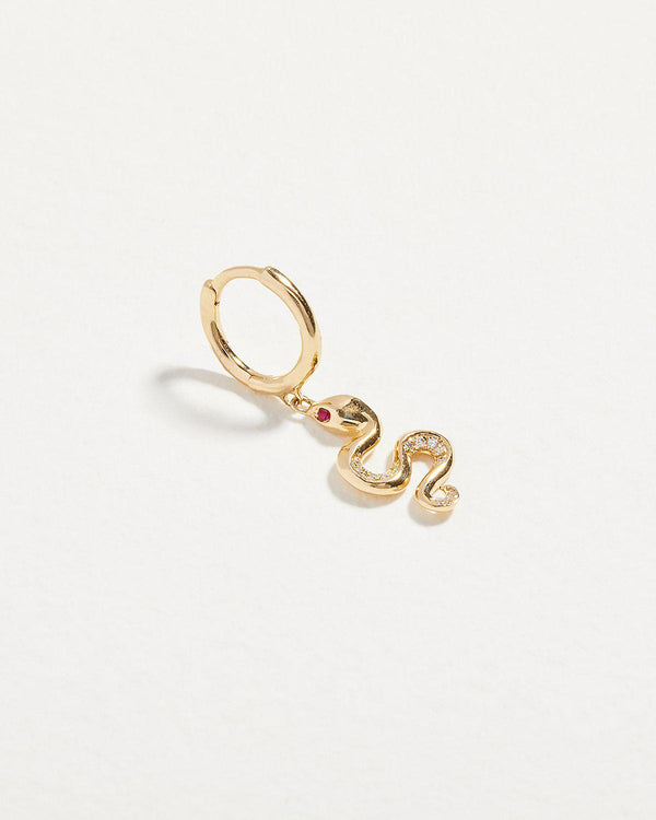 snake huggie earring with ruby eyes and diamonds