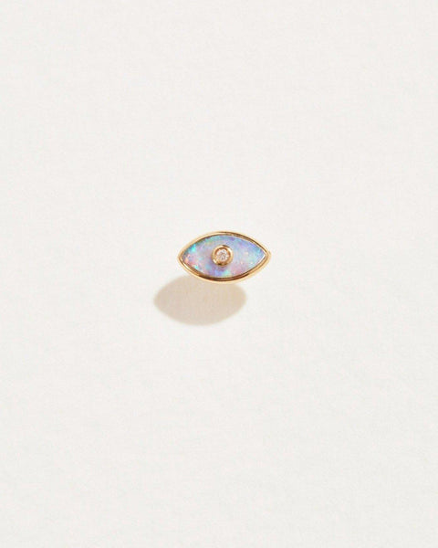 eye diamond stud piercing with opal and 14k gold