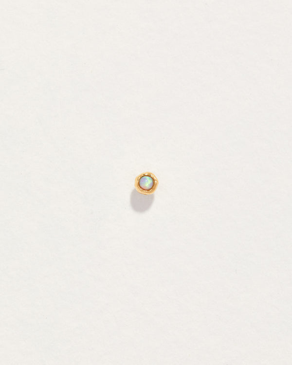 opal nugget piercing