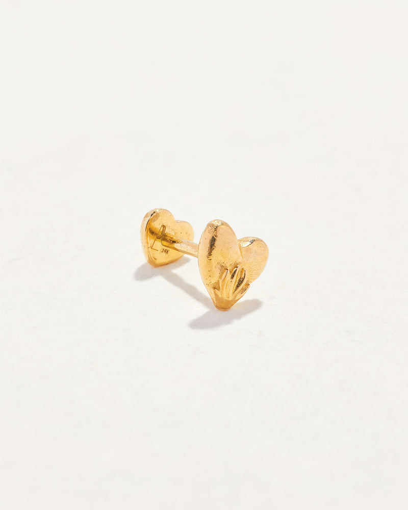 gold heart stud piercing