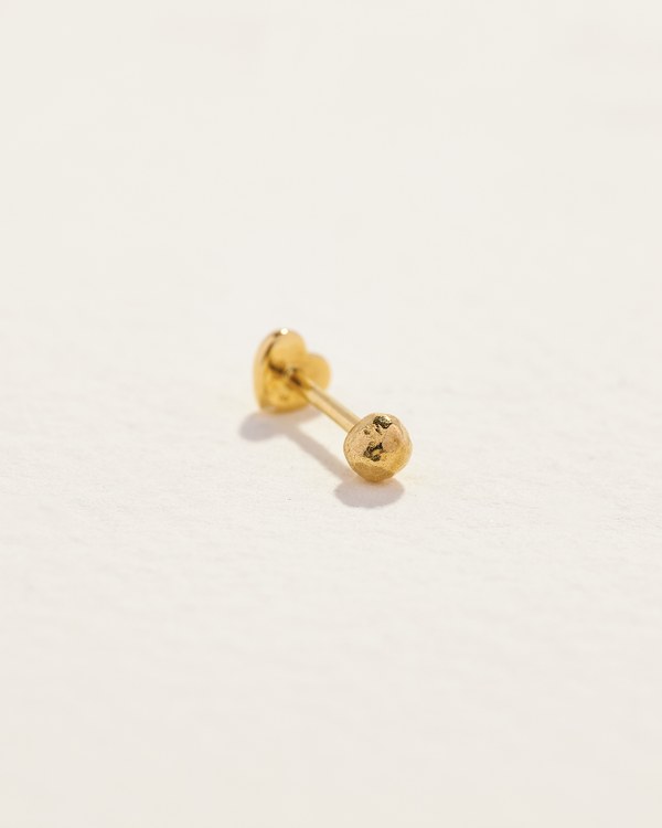 3mm 14k gold molten stud piercing