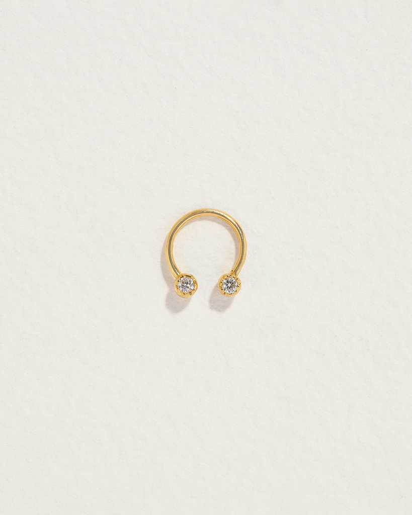 Diamond barbell piercing hotsell