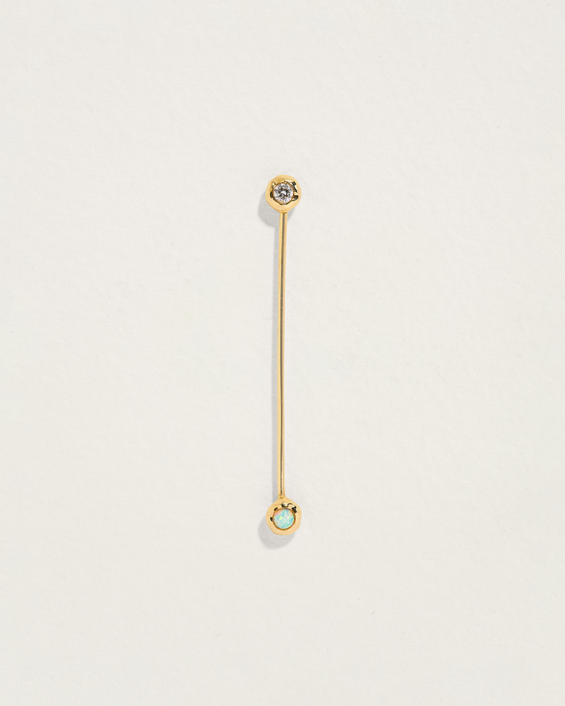 opal barbell piercing with diamond
