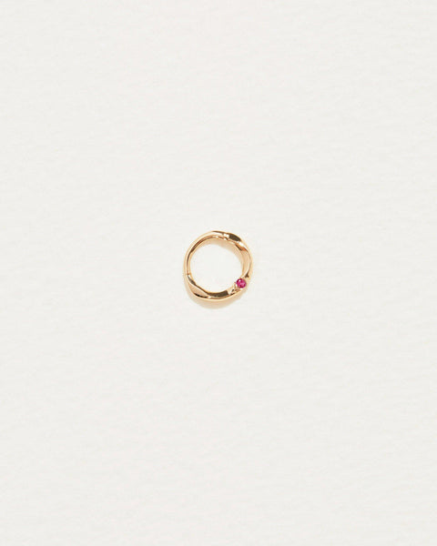 6mm floating ruby clicker piercing with 14k yellow gold