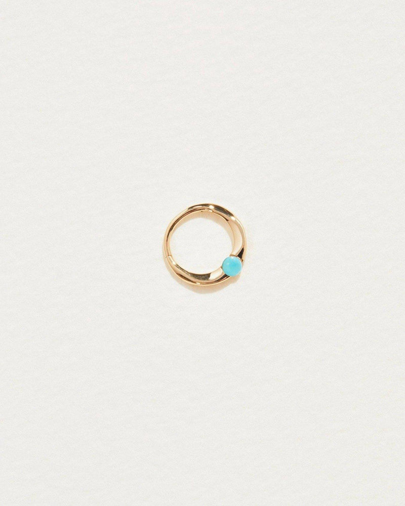 floating turquoise clicker piercing