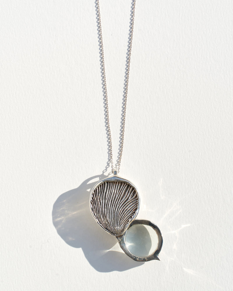 silver mushroom gills magnifying loupe necklace