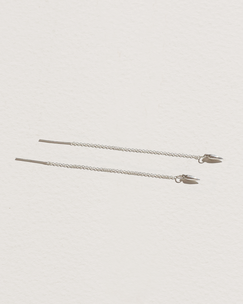 silver chain earrings with a spike
