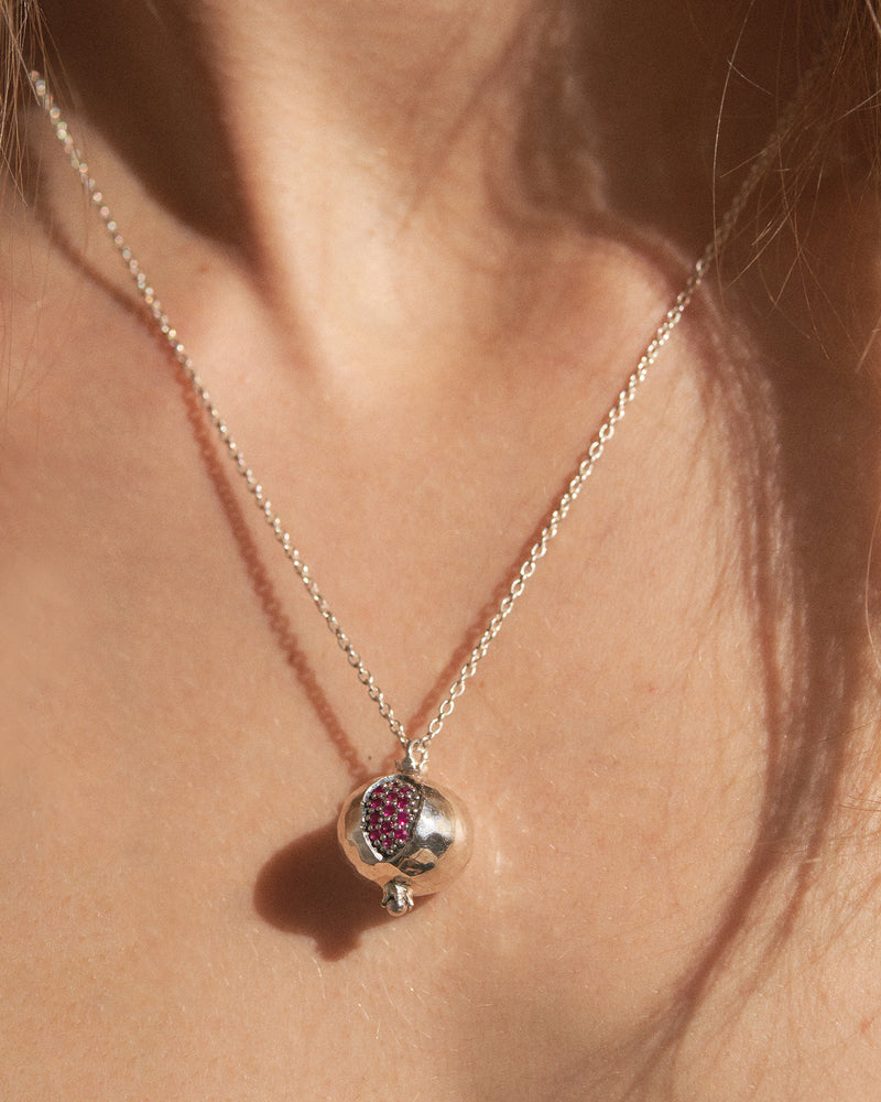 silver pomegranate pendant with ruby