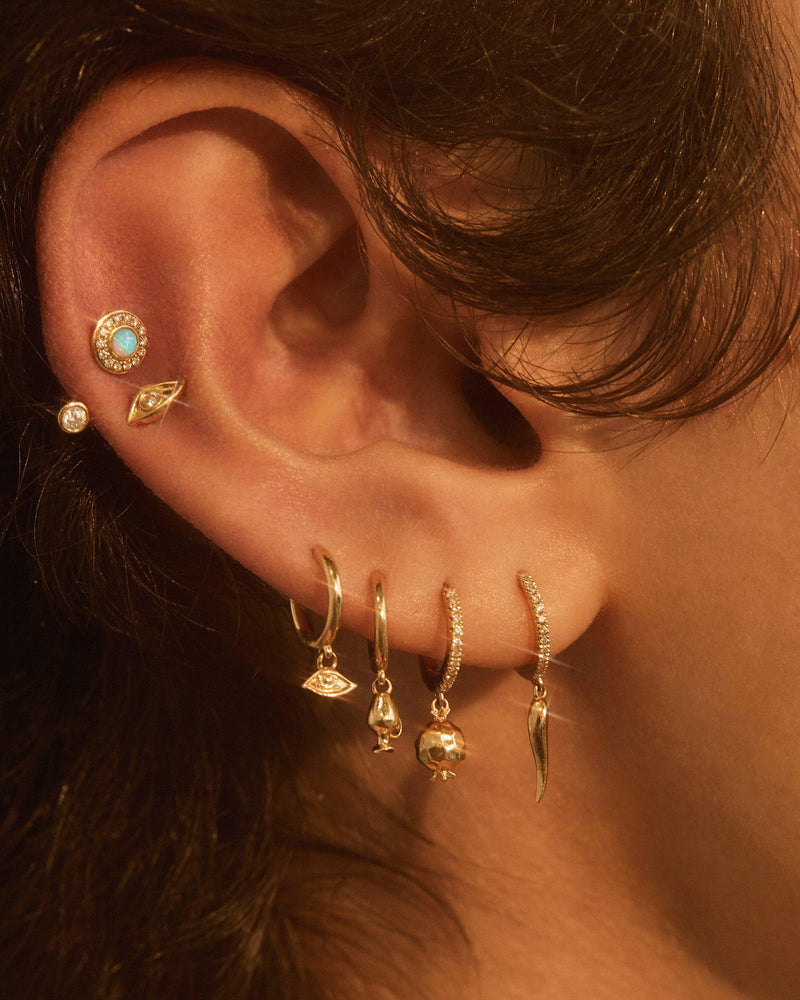 pamela love gold ear piercings
