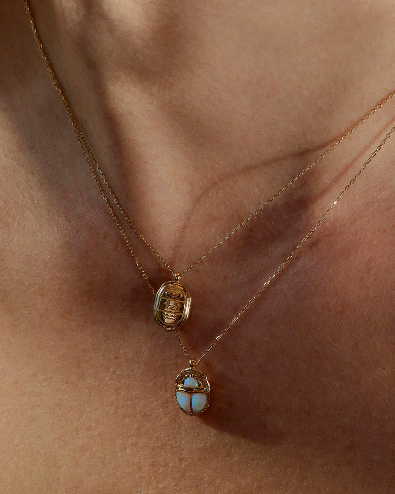 opal scarab necklace on the model