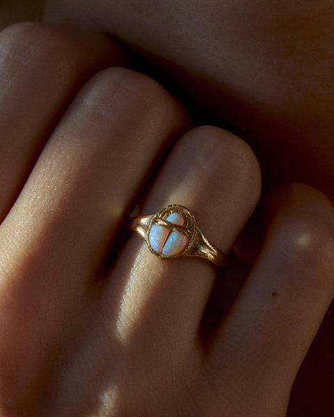 scarab ring on the models hand