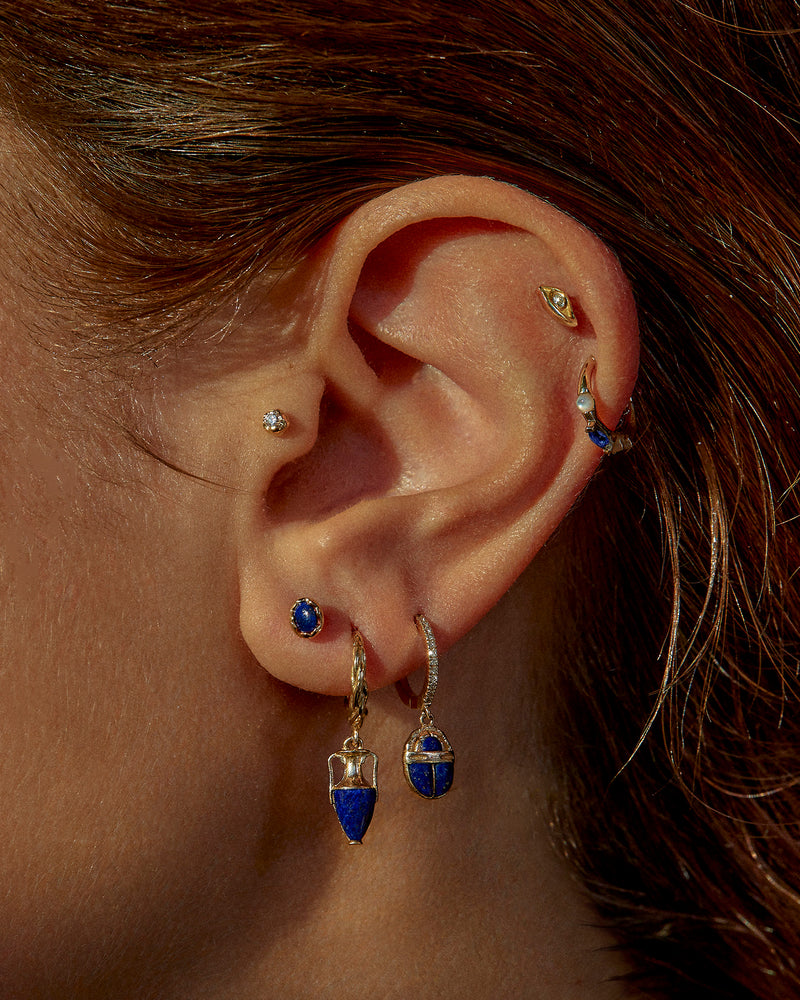 lapis stud earrings on the model