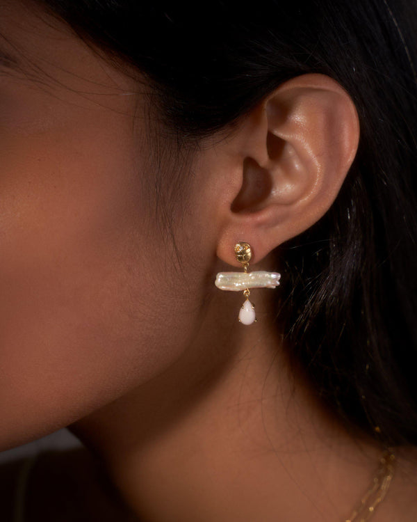 biwa earrings on the model