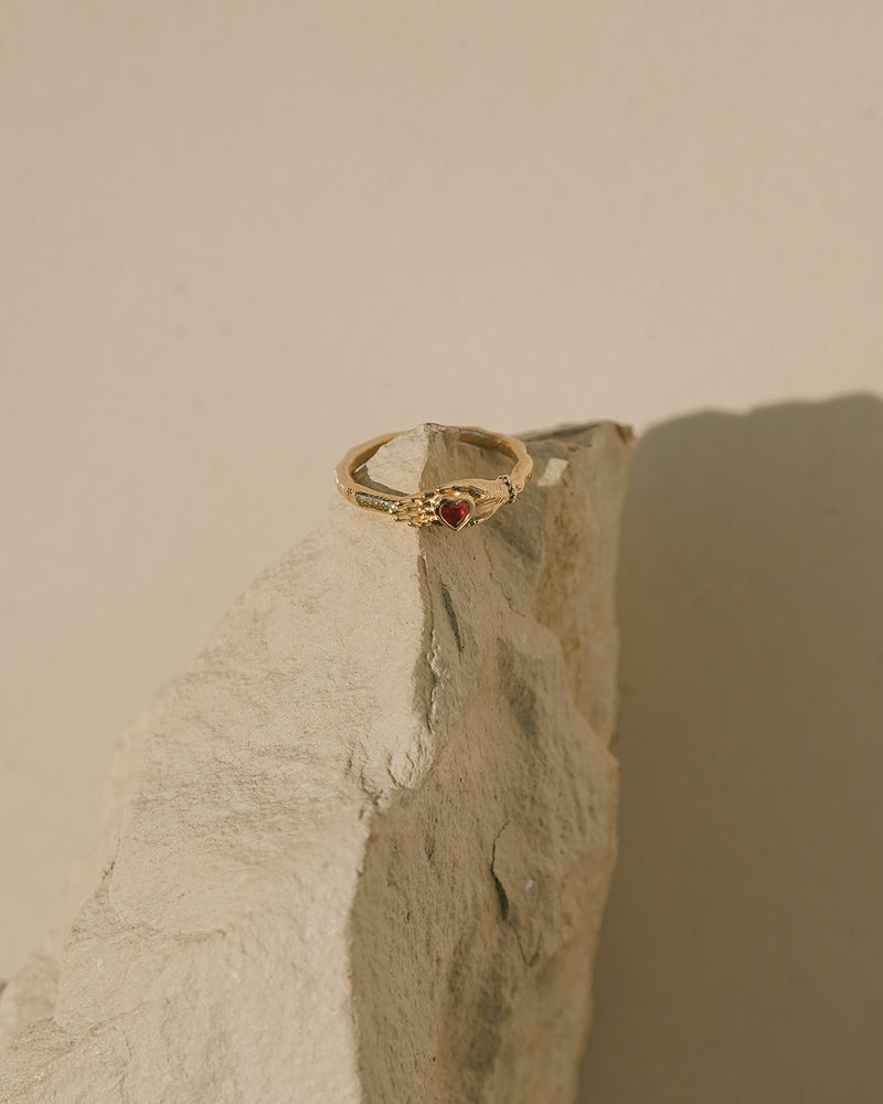 ruby heart in hand ring by pamela love