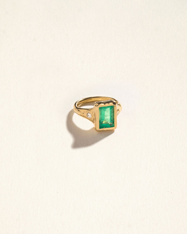 colombian muzo emerald ring with diamonds