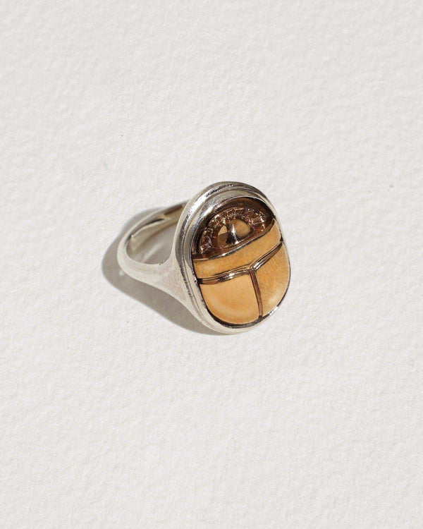 silver and brass scarab ring