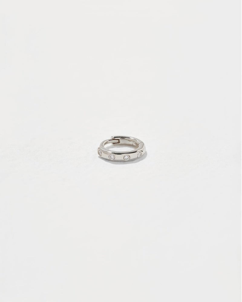 6mm Dot Huggie by Pamela Love – Piercing in #product_material# (#product_color#).