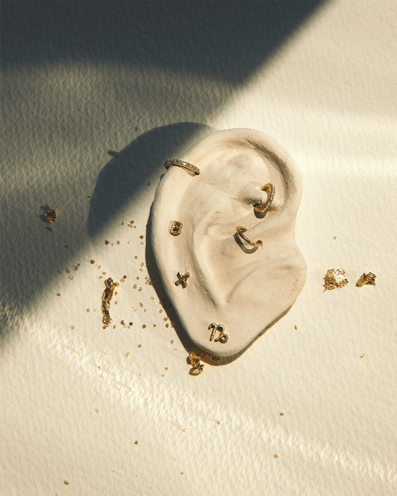 6mm Pavé Huggie by Pamela Love – Piercing in #product_material# (#product_color#).