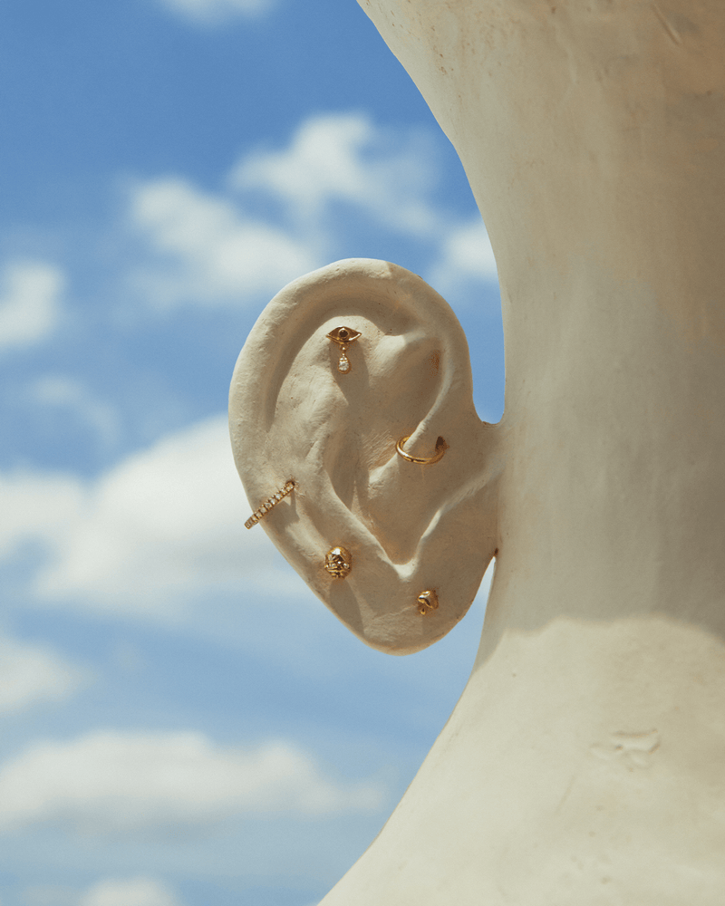 8mm Pavé Huggie by Pamela Love – Piercing in #product_material# (#product_color#).