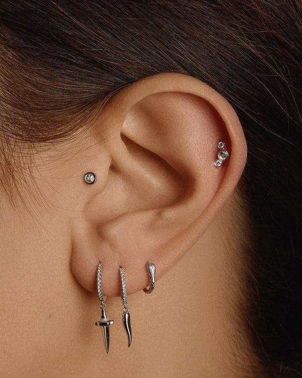 Bezel Set Crescent Stud by Pamela Love – Piercing in #product_material# (#product_color#).