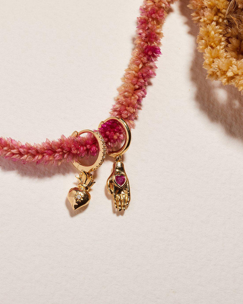 Heart in Hand Huggie by Pamela Love – Piercing in #product_material# (#product_color#).