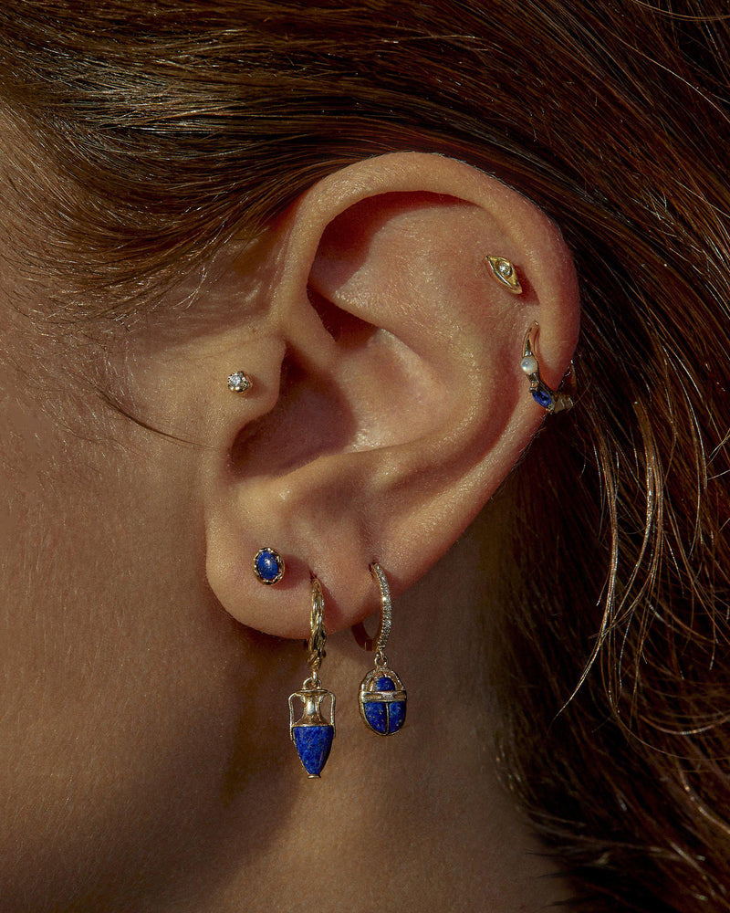 Raindrop Pave Huggie by Pamela Love – Piercing in #product_material# (#product_color#).