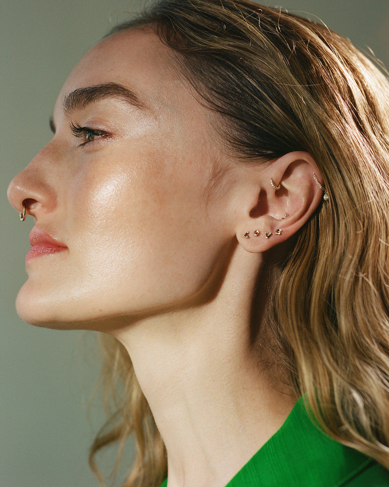 Raindrop Pave Huggie by Pamela Love – Piercing in #product_material# (#product_color#).