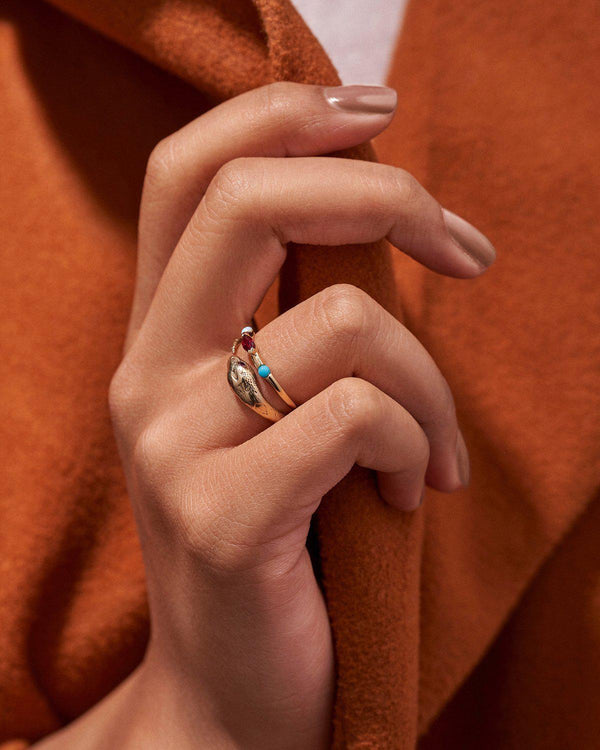 multi stone ring on models hand