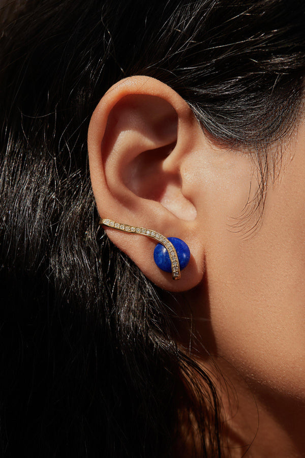 lapis comet ear climber with diamonds on the model